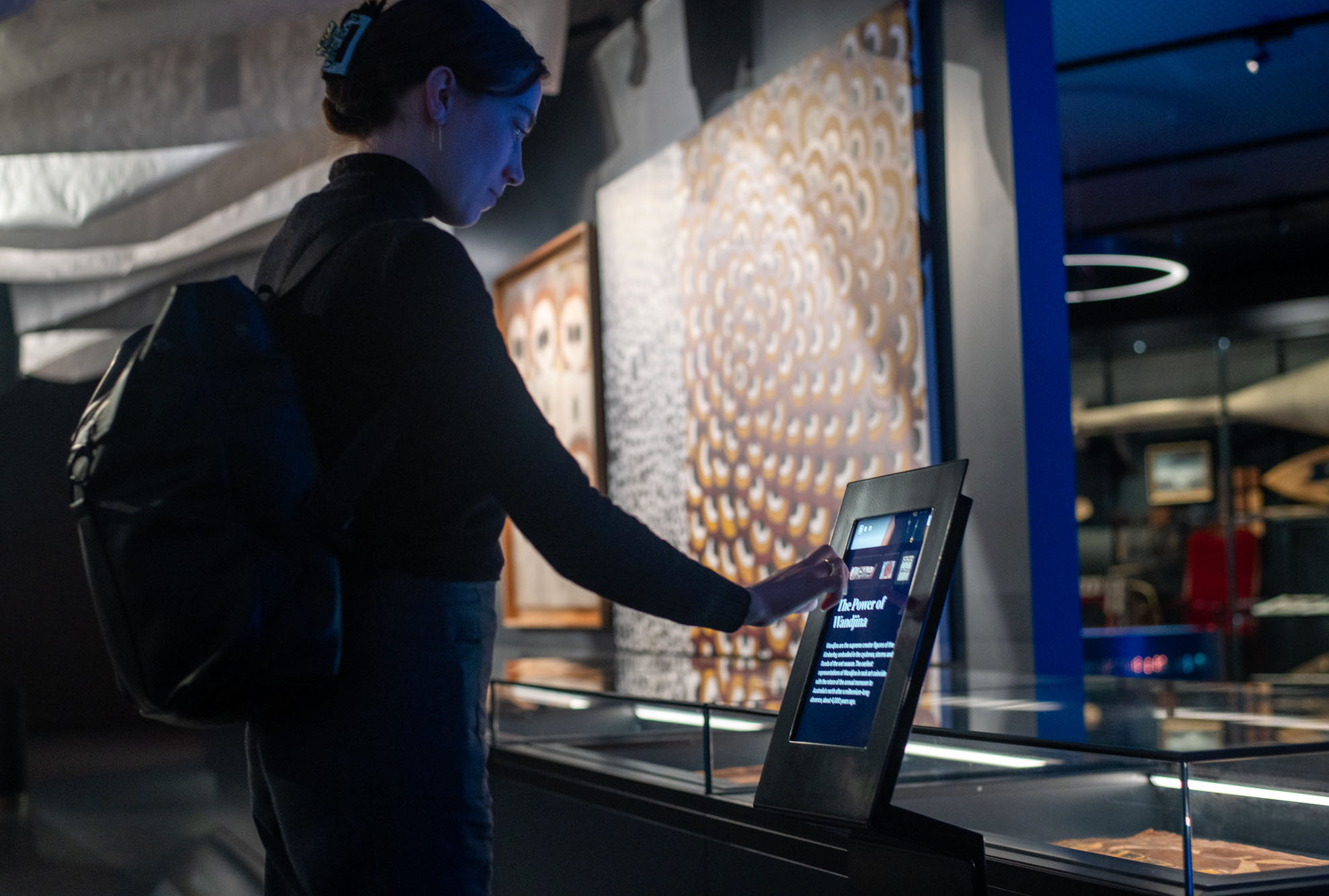 Visitor interacting with digital object label